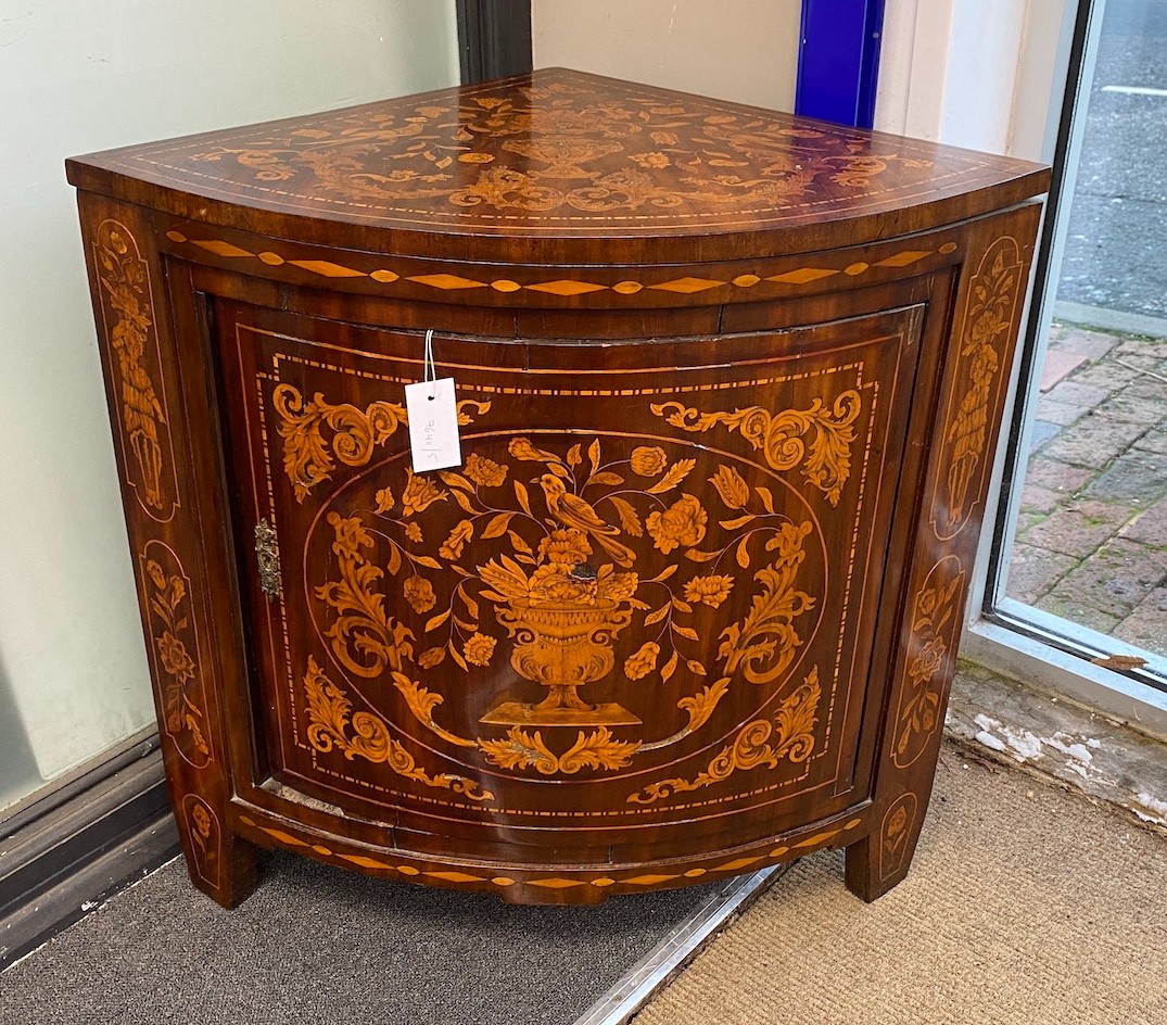 An early 19th century Dutch floral marquetry walnut bow front corner cabinet, width 35cm, depth 52cm, height 73cm
